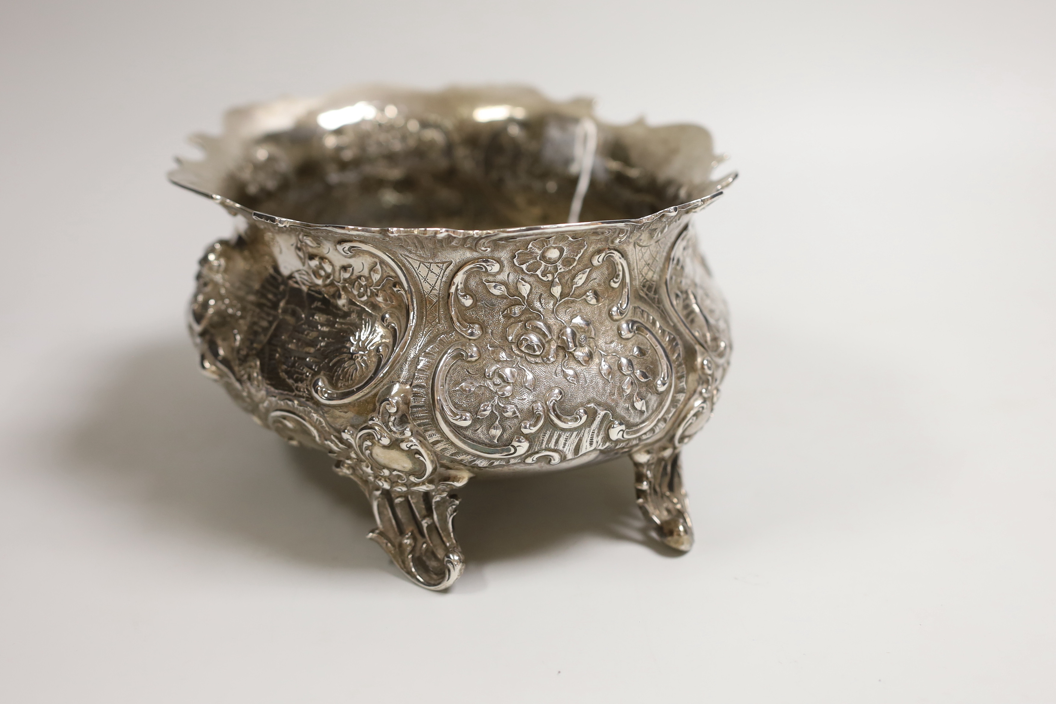 An ornate late 19th century German embossed silver oval fruit bowl, with pierced scroll feet, import marks for London, 1890, length 23.9cm, 30oz.